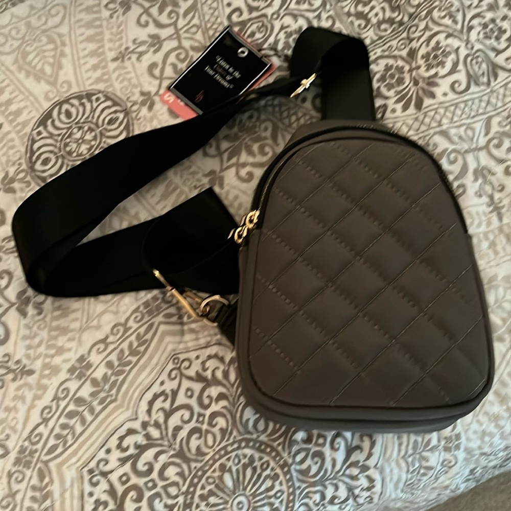 Excellent condition 9x6x3 greyish/green sling bag with gold hardware.